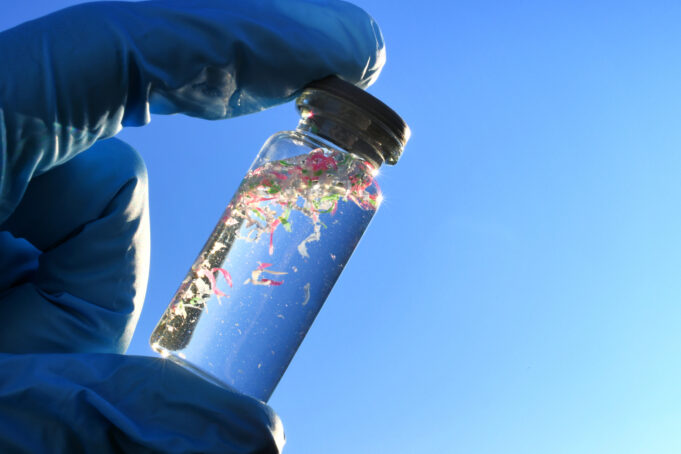 Water sample contaminated with microplastics